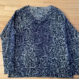 v neck cashmere leopard print sweater in a black and light green color pattern